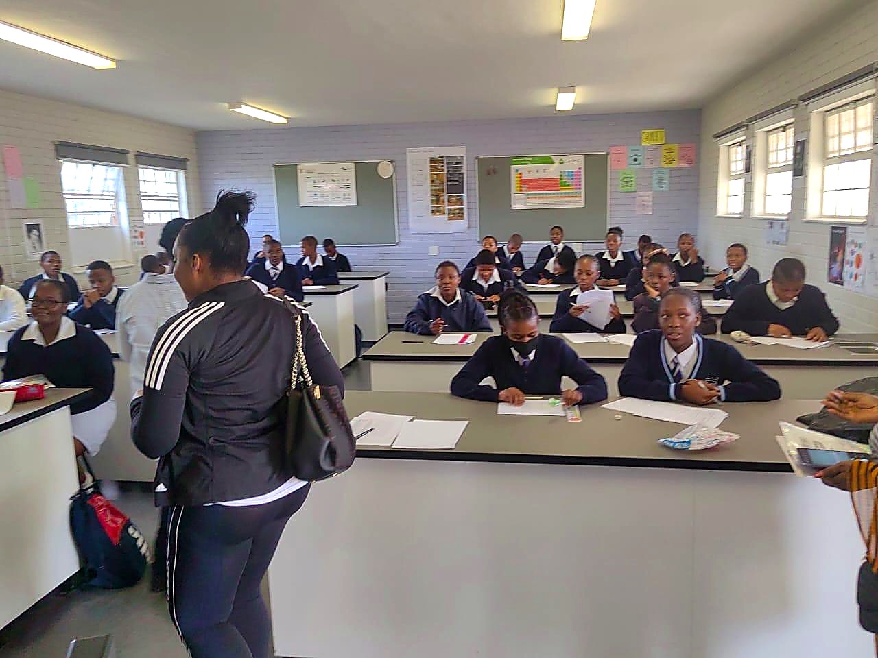FlourishHEr classroom outreach with students learning together in South Africa